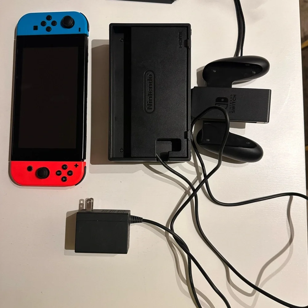 Nintendo Switch with Red and Blue Joy-Con Controllers